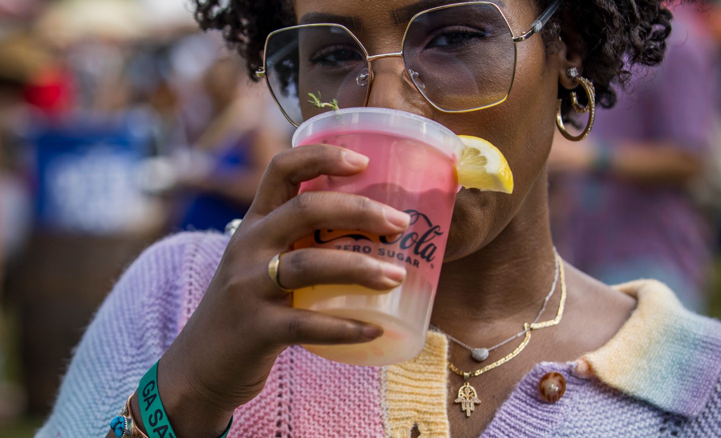 person drinking at a21 event