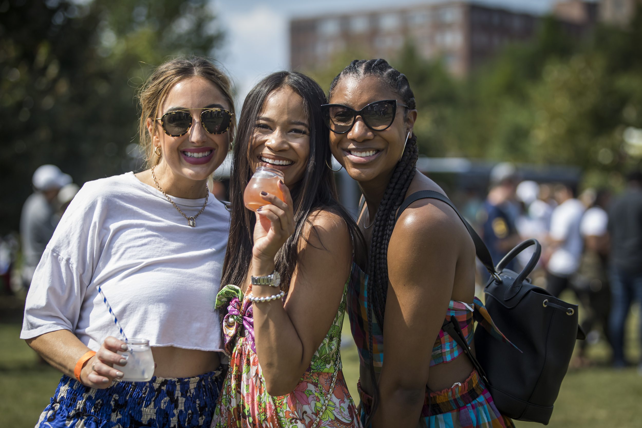 women smiling at Atlanta Food & Wine Festival