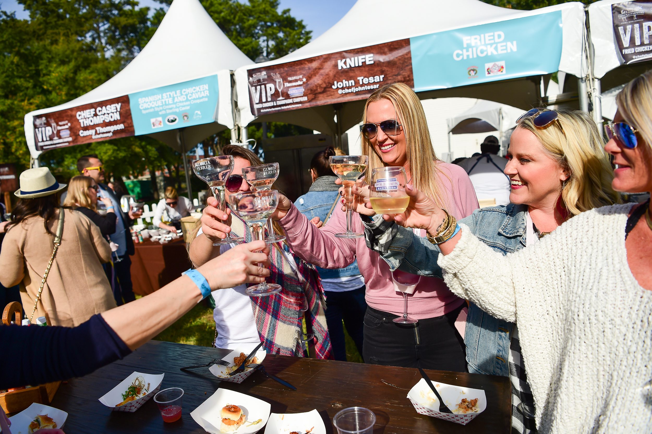 people drinking at a21 event Chefs for Farmers