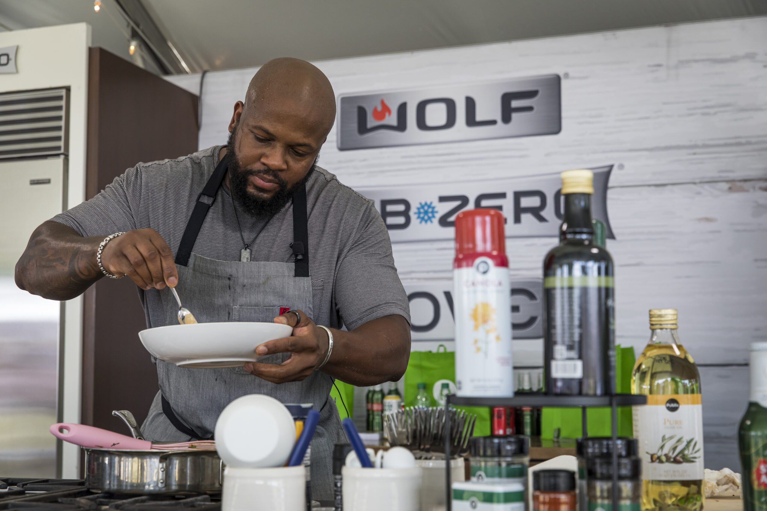 chef cooking at a21 AFWF 2021 event